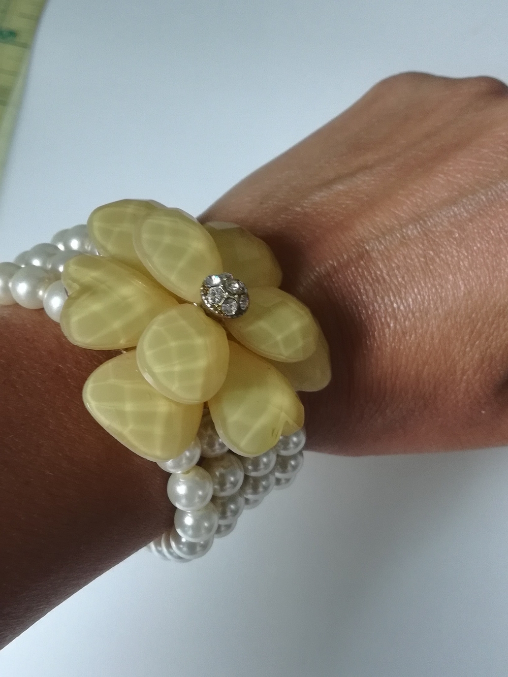 Pearl Stretch Bracelet with Yellow Flower Accent